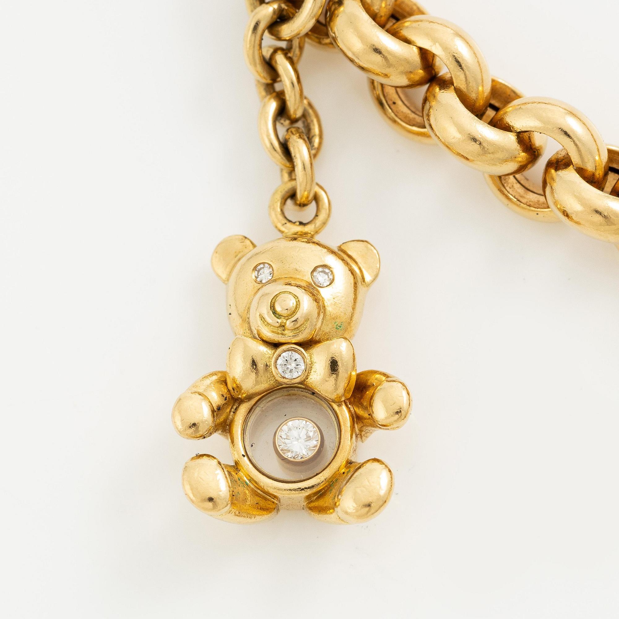 Chopard armband med berlocker 18K guld med runda briljantslipade diamanter.