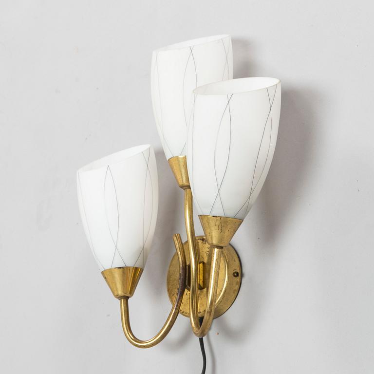 A mid 20th century wall lamp for Itsu Finland.