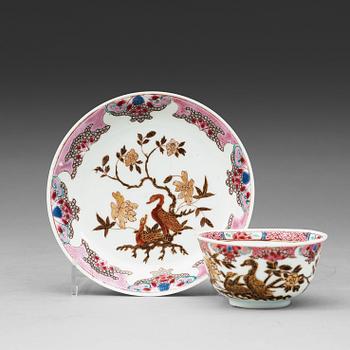 A set of seven odd famille rose cups with saucers, Qing dynasty, Yongzheng (1723-35).