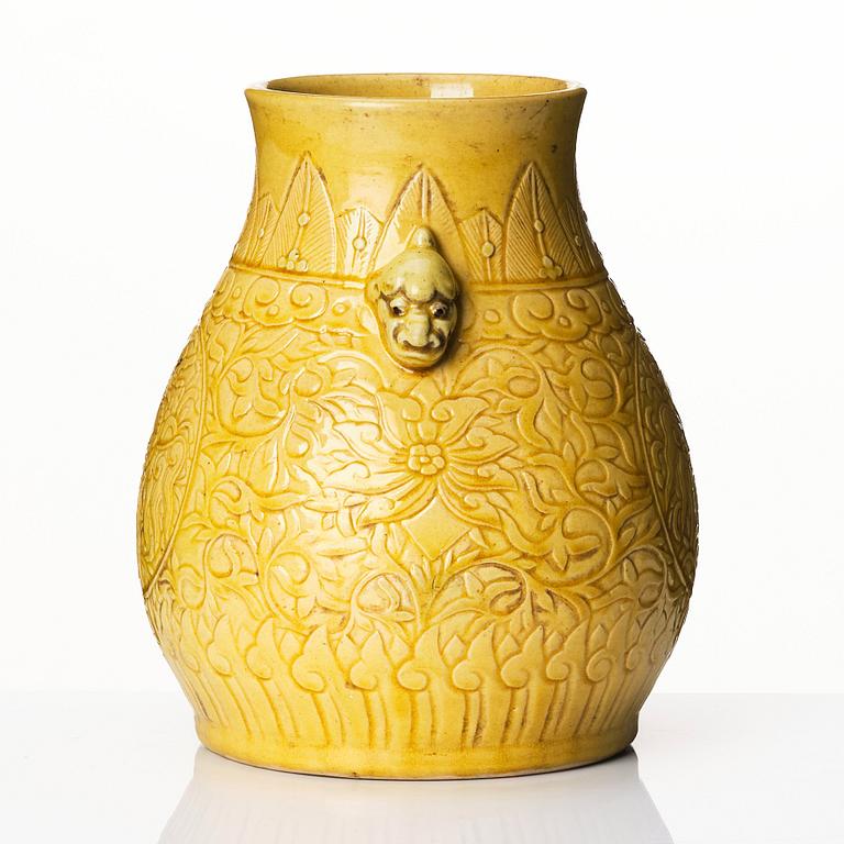 A yellow glazed phoenix vase,  Qing dynasty, with a Kangxi mark.