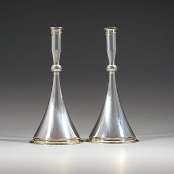 A pair of Wiwen Nilsson sterling 'byzantine style' candlesticks, Lund Sweden 1950.