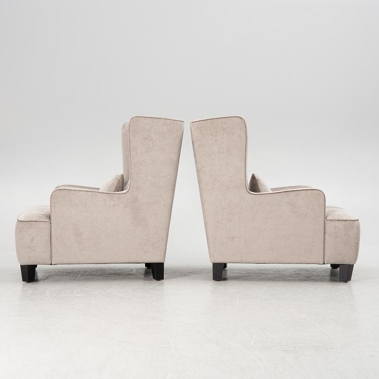 A pair of easy chairs, 21st century.