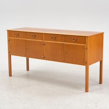 Josef Frank, a mahogany veneered sideboard, Firma Svenskt Tenn, second half of the 20th century.