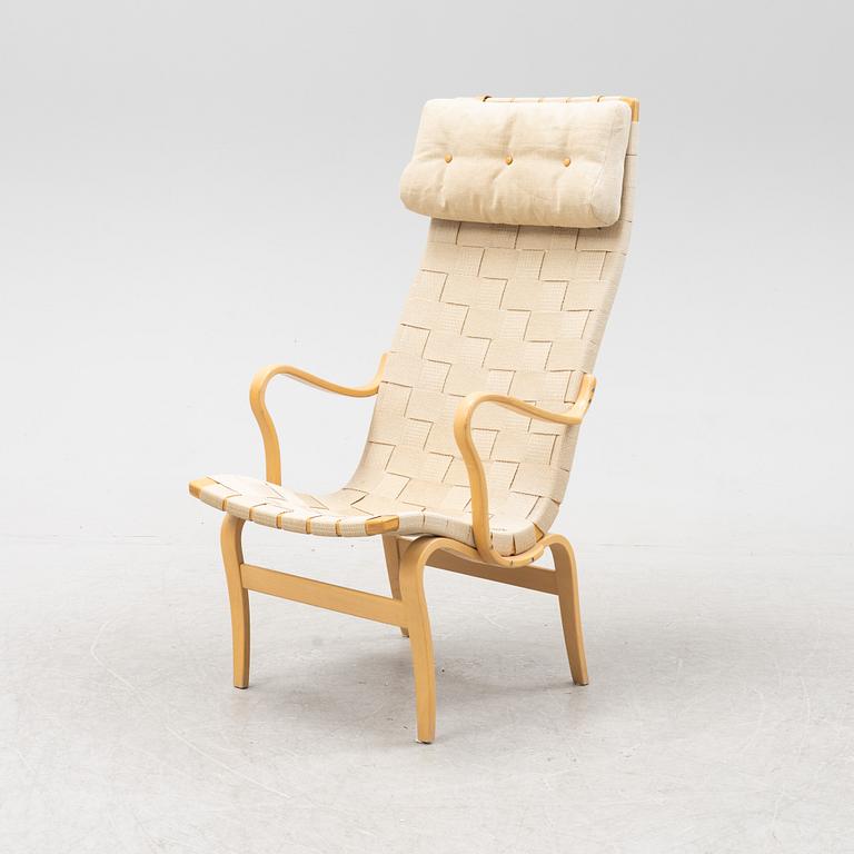 An 'Eva' easy chair by Bruno Mathsson for Dux.