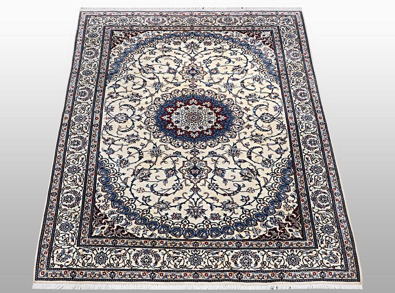 A rug, Nain, Part Silk, sk 6 LAA, ca 204 x 137 cm.