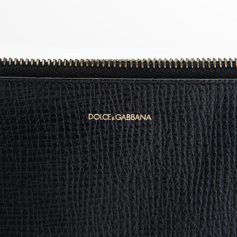 Dolce & Gabbana, portfölj/laptopväska och pouch/clutch.