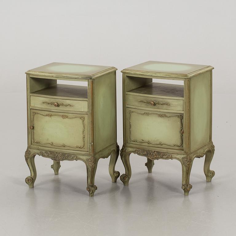 A PAIR OF BEDSIDE TABLES.