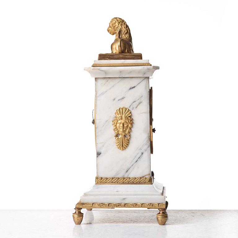 A Swedish Empire early 19th century mantel clock.