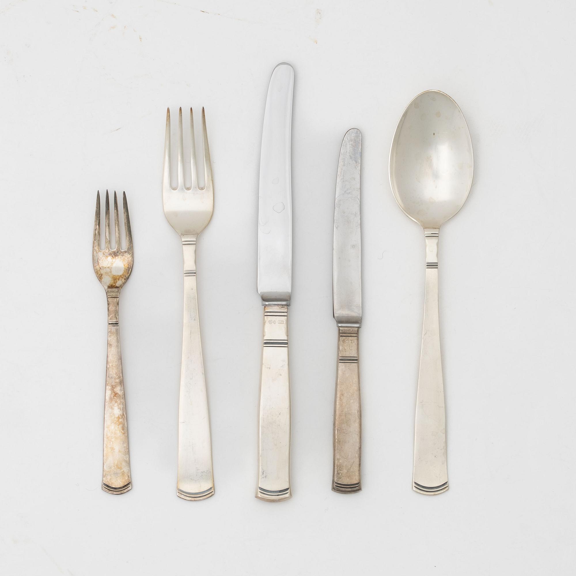 Jacob Ängman, an 84-piece silver cutlery service, model 'Rosenholm', GAB, Eskilstuna and Stockholm, including 1975.