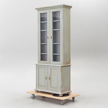 Display cabinet, early 20th century.
