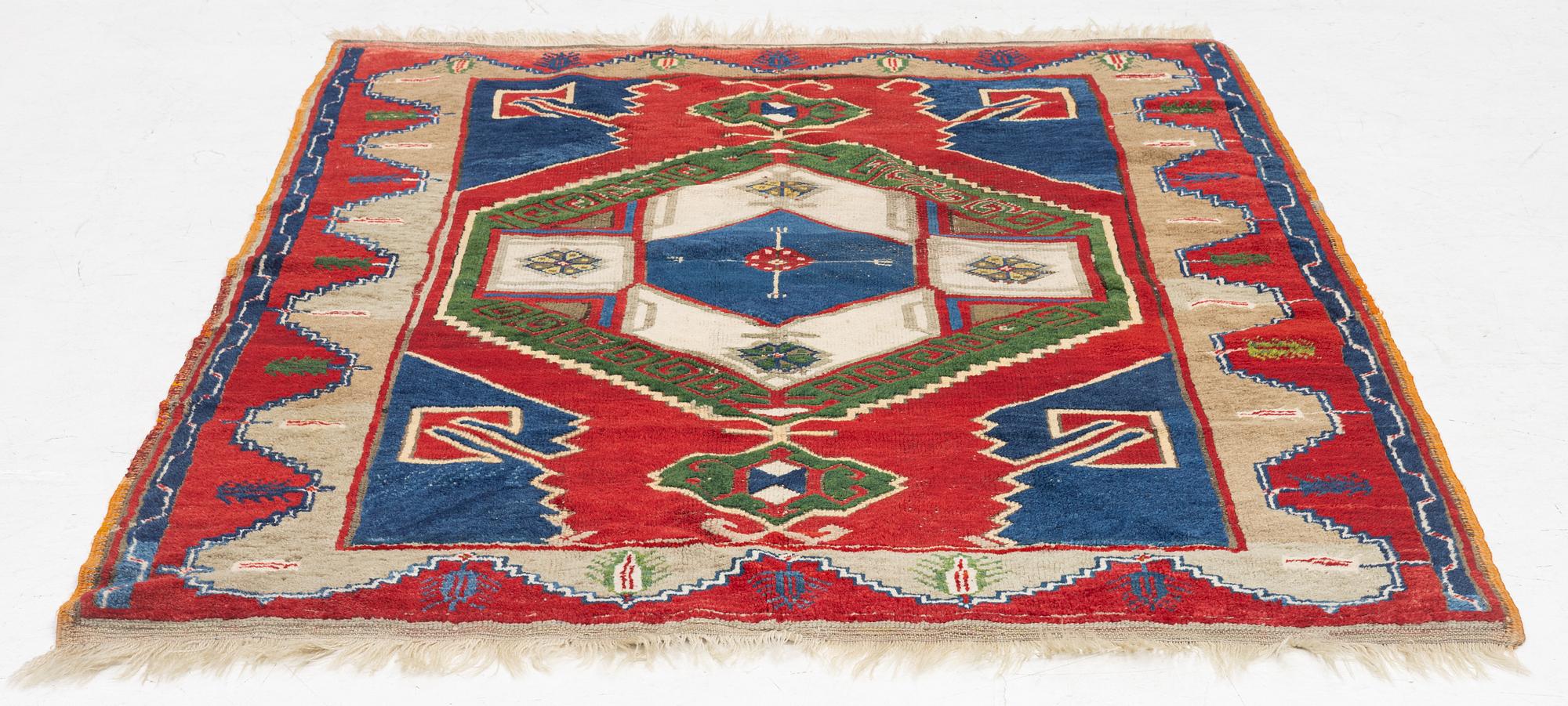 An antique Anatol rug, c. 170 x 134 cm.