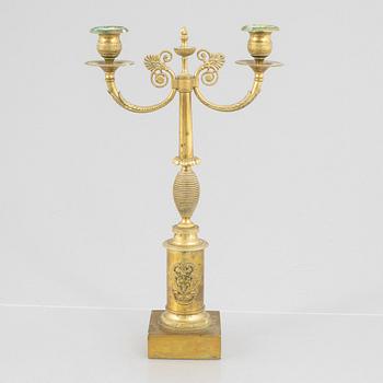 An Empire candelabra, first half of the 19th century.