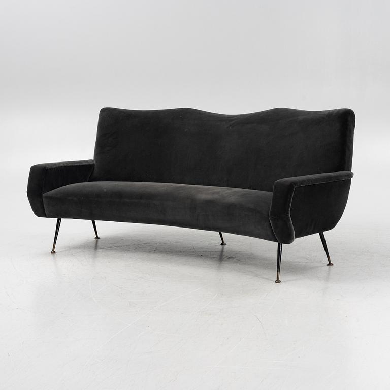 A curved sofa with velvet covering, 20th Century,