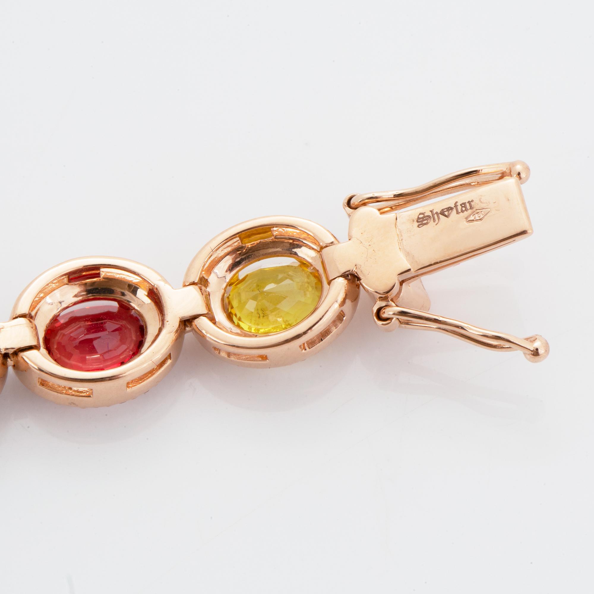 Multi coloured colour sapphire and diamond bracelet.