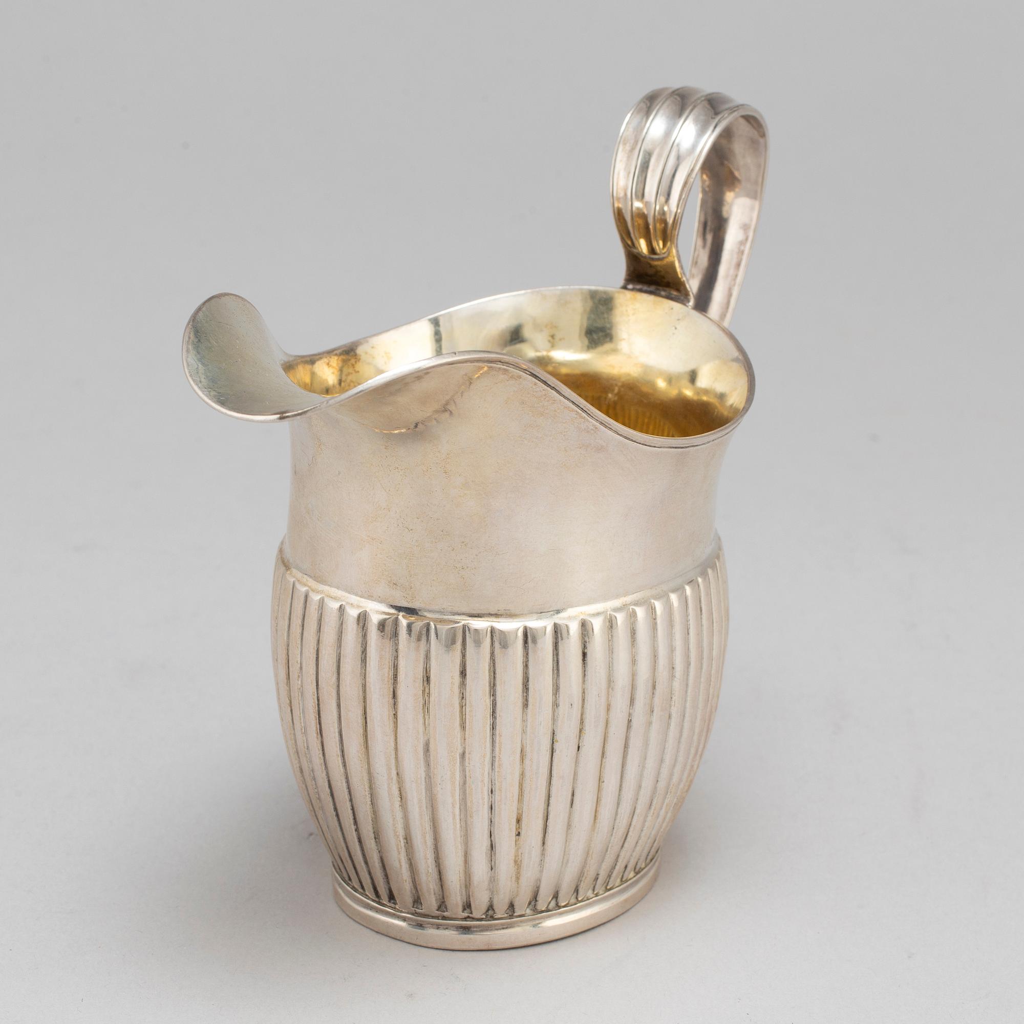 A silver creamer by JL Klint, Norrtälje 1828.