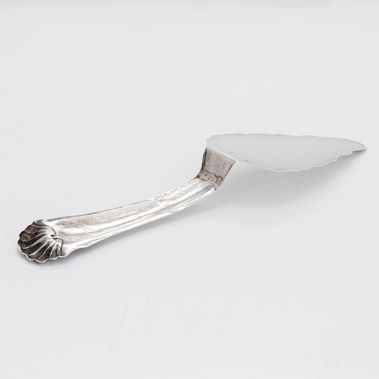 Cream jug, cake server, and sugar tongs in silver, Finland from latter part of the 18th century to 1854.