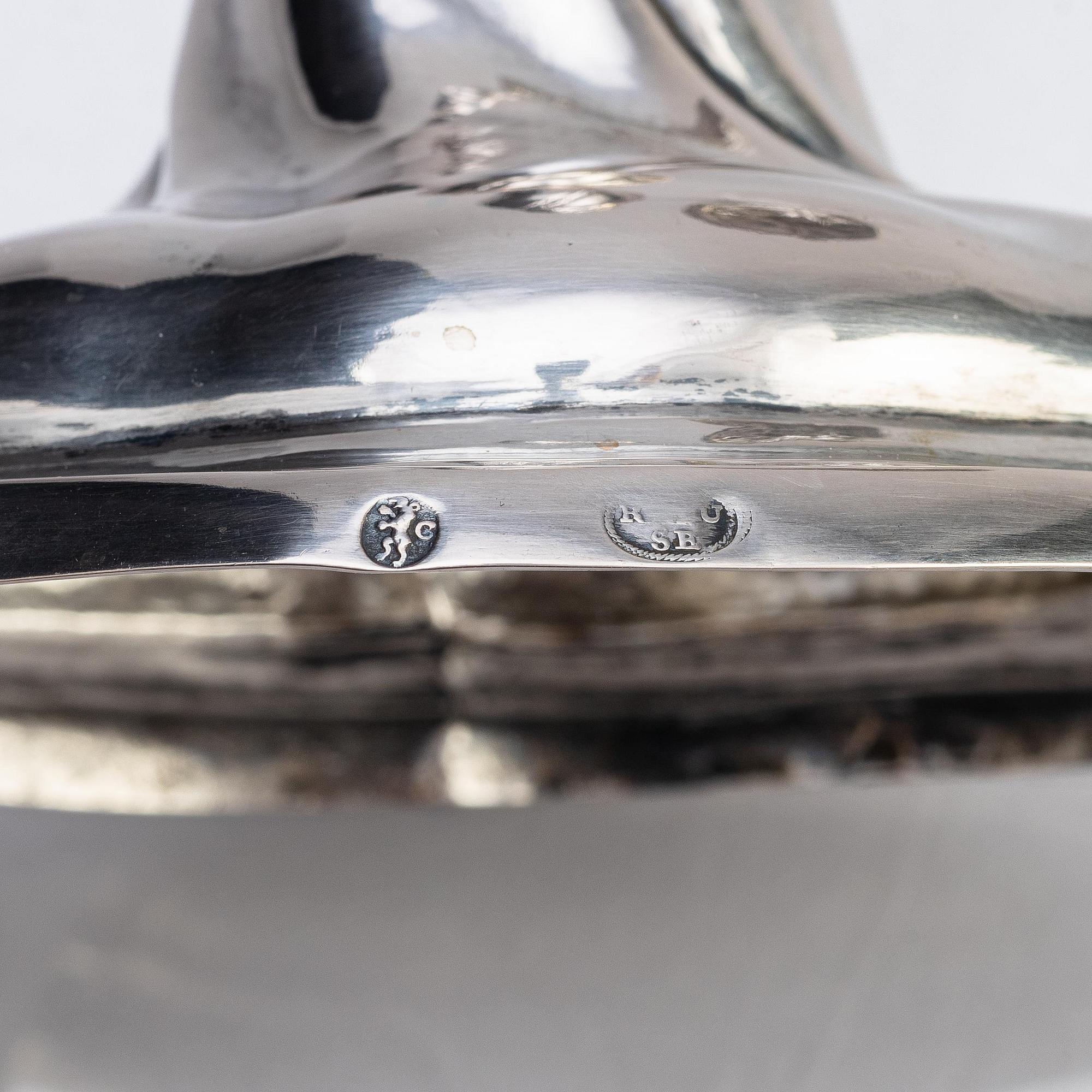 A pair of German 18th century silver candlesticks, possibly mark of Friedrich Wilhelm Krause, Berlin 1788-1802.