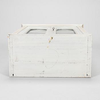 A late 19th-century wooden wall cabinet.