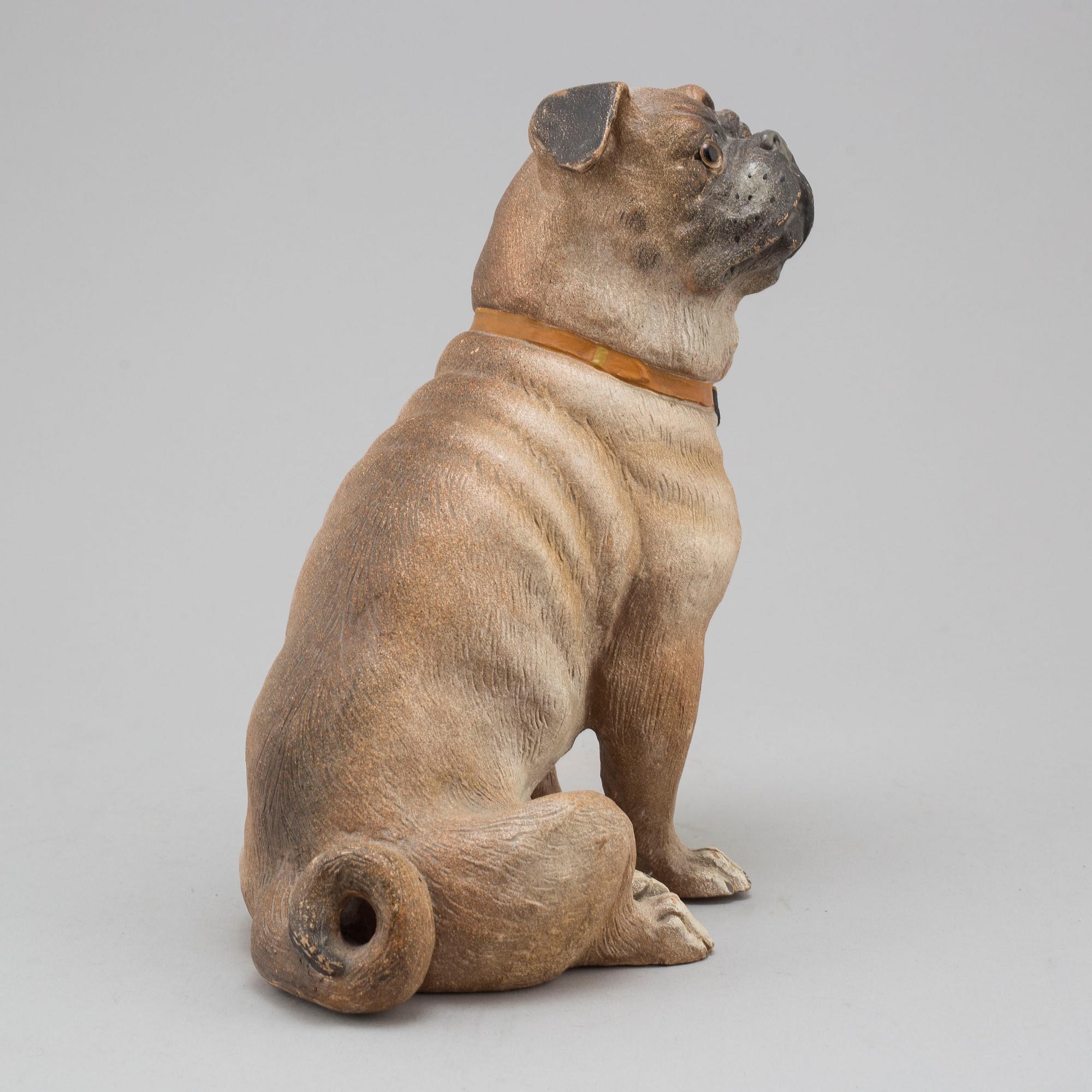 An early 20th century terracotta dog.