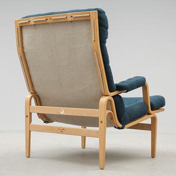 FÅTÖLJ, "Ingrid", Bruno Mathsson, DUX. 1900-talets andra hälft.