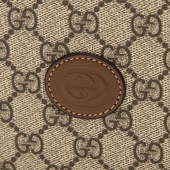 Gucci, "GG Supreme" laukku.