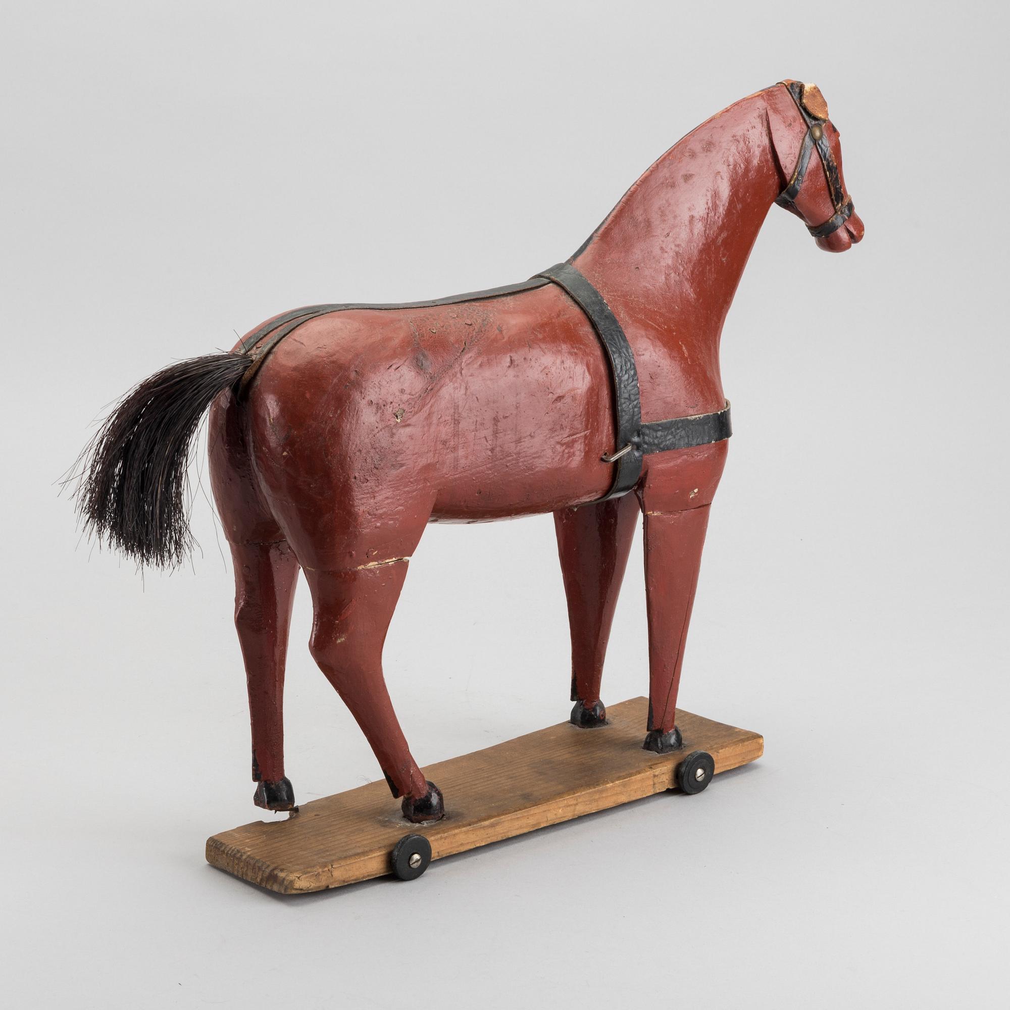 A toy wooden horse, late 19th cenury / turn of the century 1900.