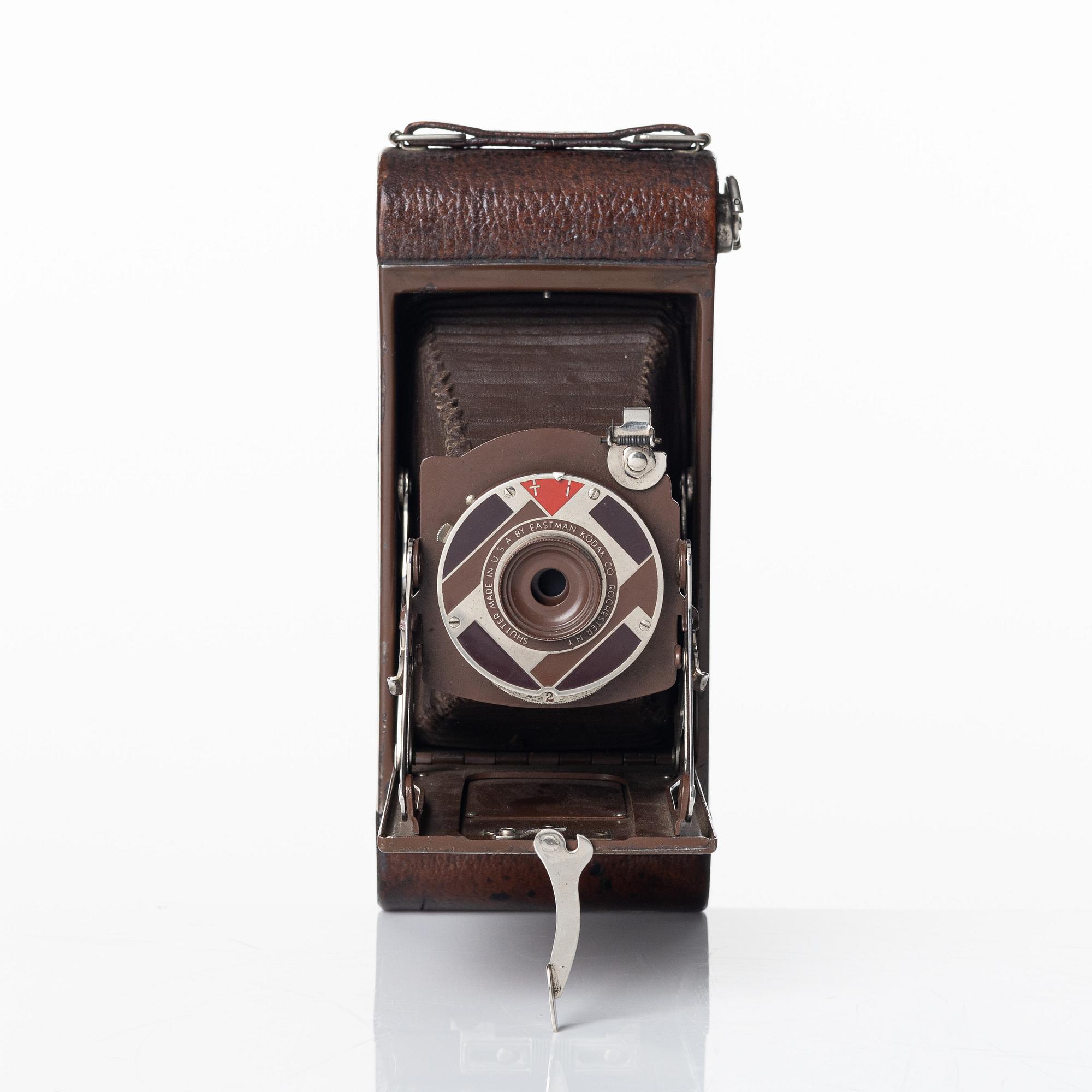 Walter Dorwin Teague, a folding camera in in a lacquered case, USA 1930s.