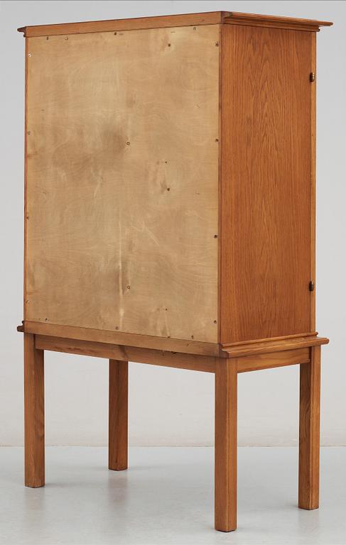 An Oscar Nilsson oak cabinet, probably executed by cabinetmaker J Wickman, Stockholm 1940's.