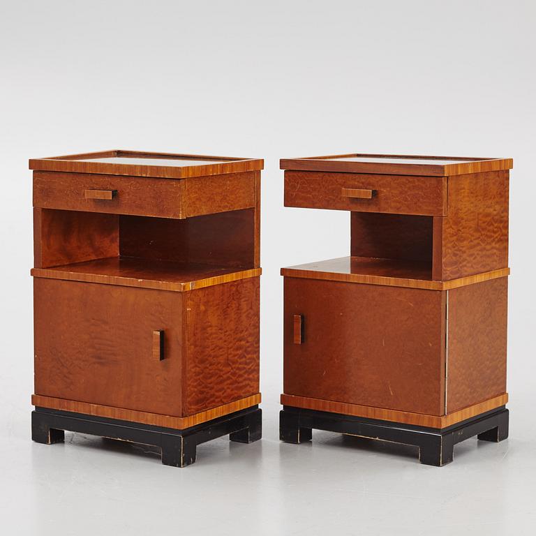 A pair of 1930's bedside tables.