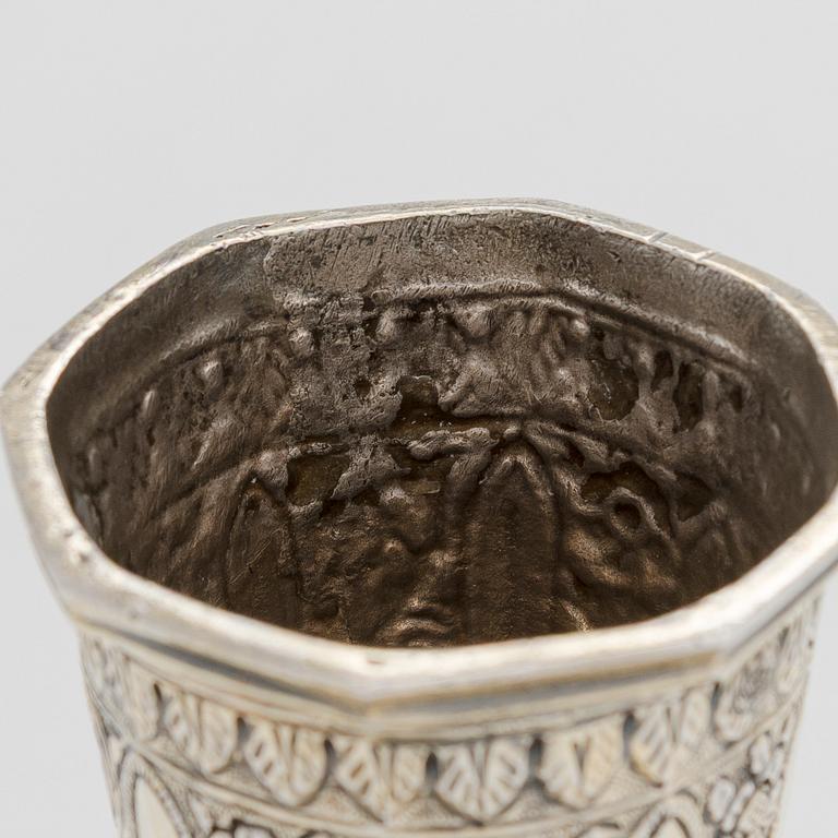 A parcel-gilt silver repoussé water pipe huqqa base, 18th/19th Century.