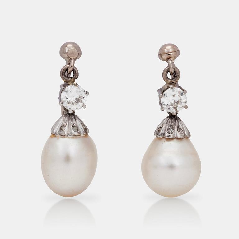 A pair of possibly natural pearl and diamond earrings.