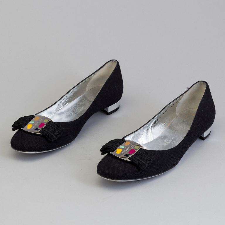 A pair of ballerina shoes by Salvatore Ferragamo.