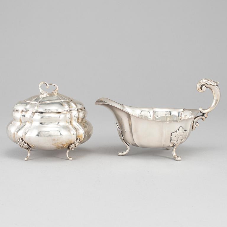 A rococo-style 20th century silver cream-jug and sugar-box, Swedish import marks.