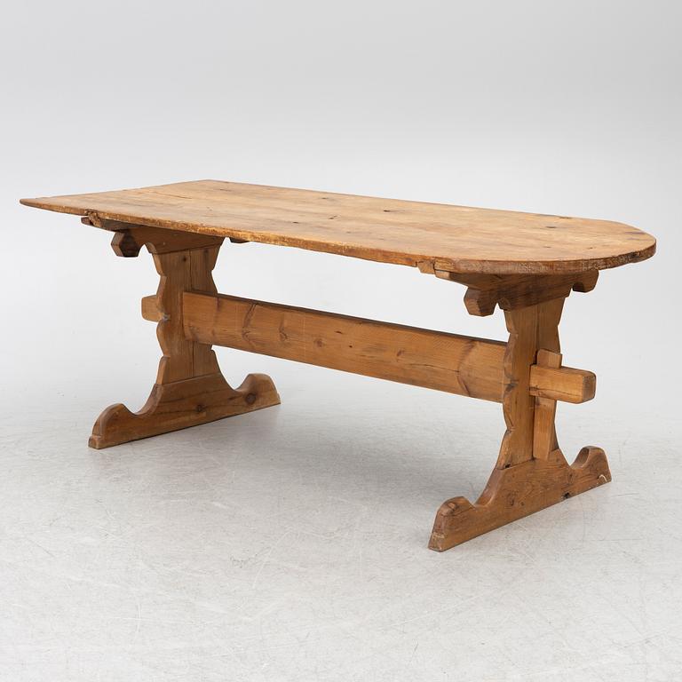 A 19th century pine table.