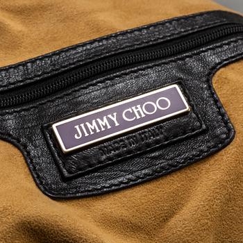 A leather bag by Jimmy Choo.