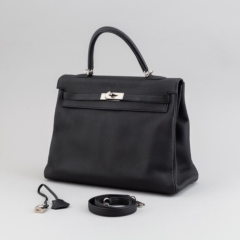 Hermès, a 'Kelly 35' black leather bag, 2017.