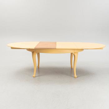 A 13-piece Rococo style dining room furniture suite, 20th Century.