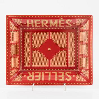 Hermès, a 'Sellier' porcelain change tray.