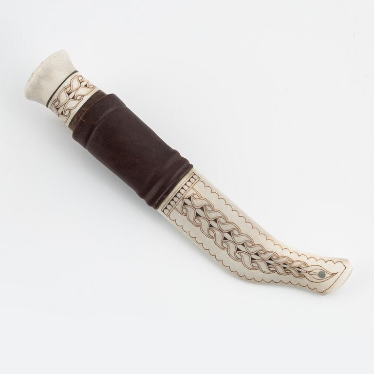 A reindeer horn knife by Bertil Fällman, signed.