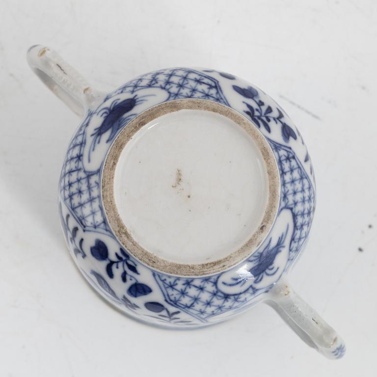 A pair of Chinese blue and white porcelain chocolate cups and four custard cups, Qing dynasty, late 18th century.