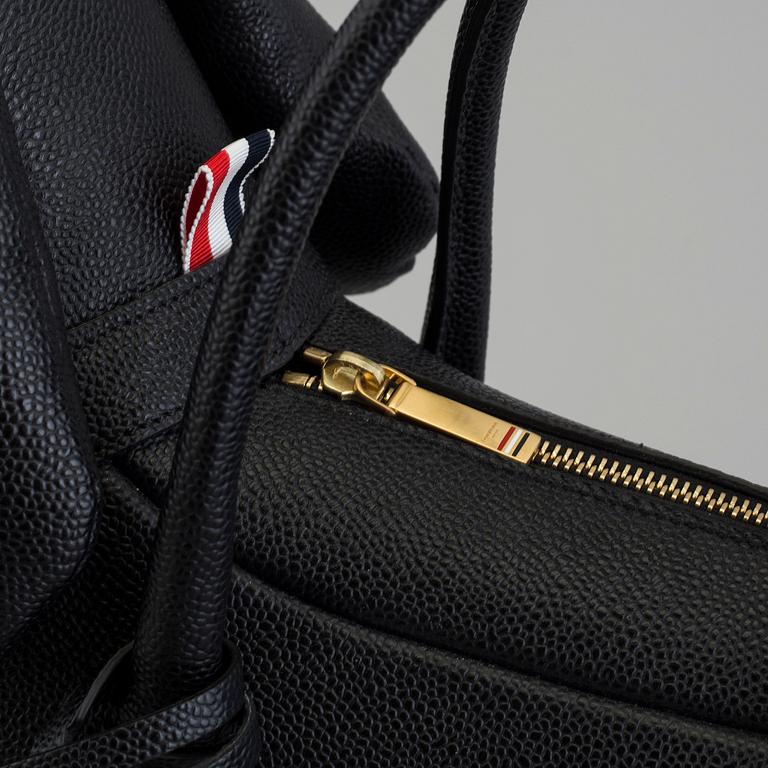 A "Hector Bag" by Thom Browne.