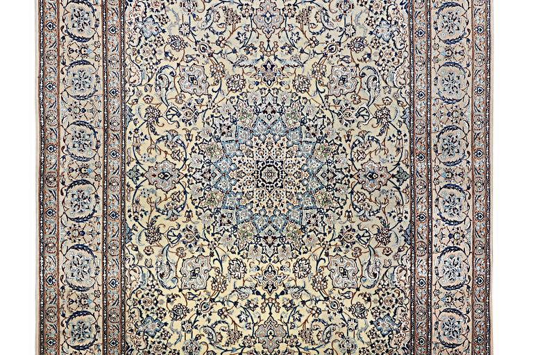 A Nain carpet, part silk, 6 laa, c. 283 x 180 cm.