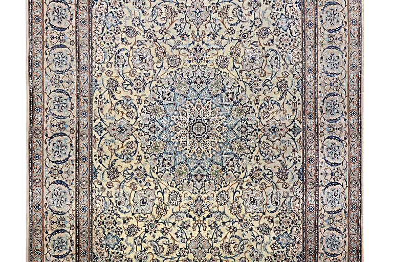 A Nain carpet, part silk, 6 laa, c. 283 x 180 cm.