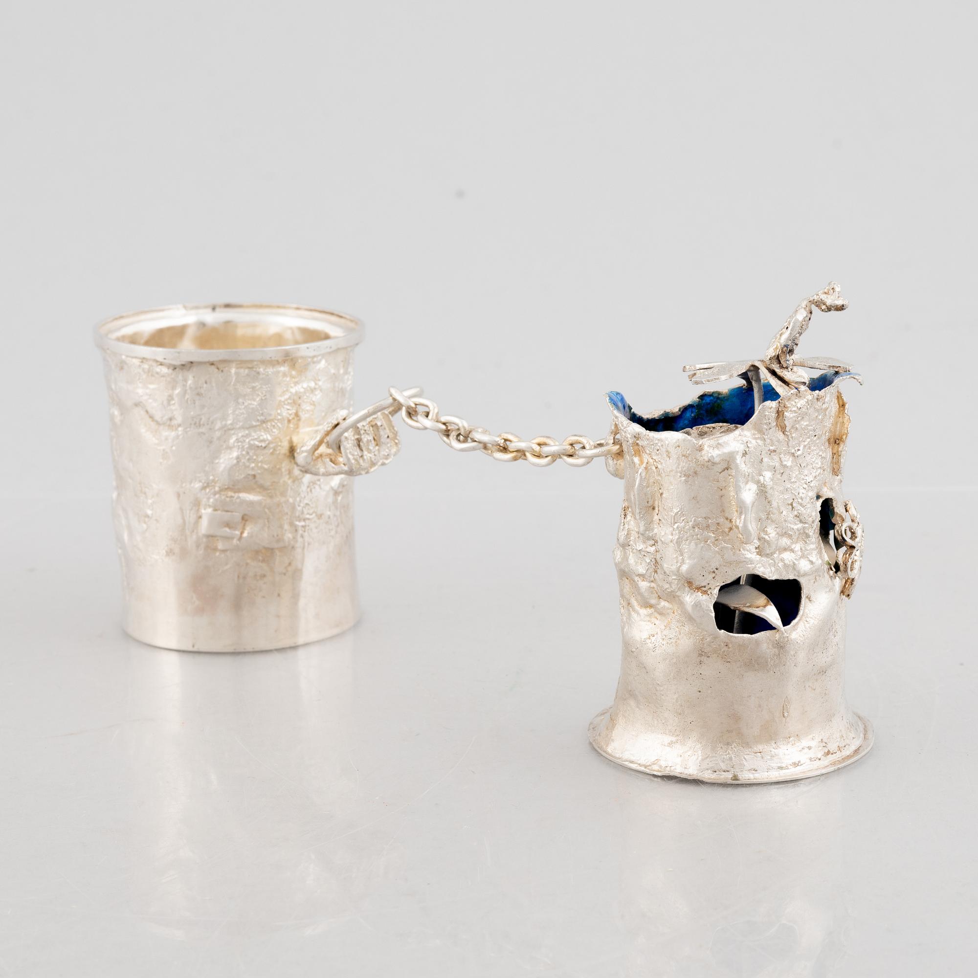 A sterling silver sculpture in two parts with a chain, mark of Lars Arby, Gothenburg, Sweden 1976.