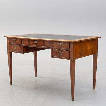 A circa 1900 late Gustavian mahogany veneered desk.