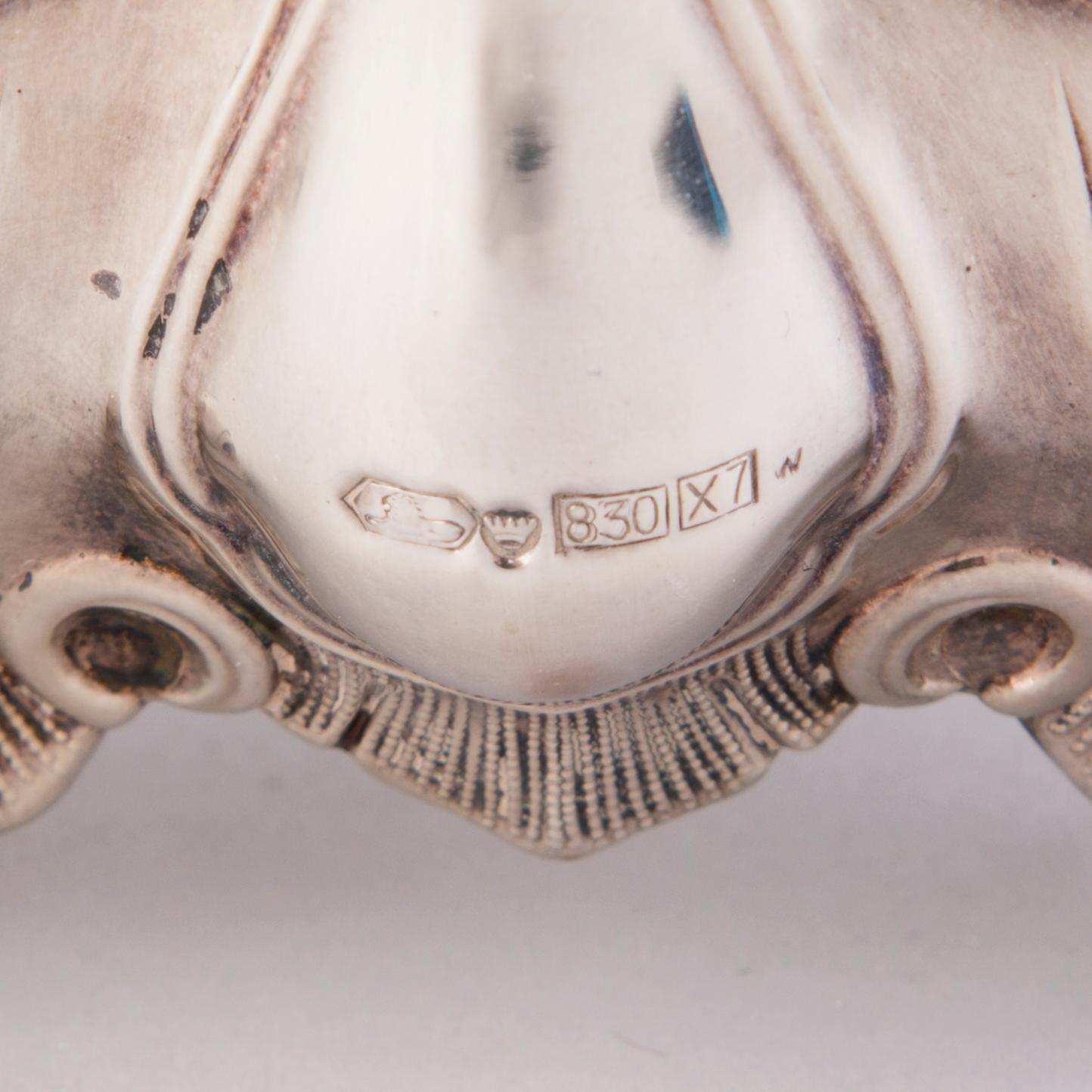 CANDELABRUM AND CANDLESTICK, silver, Kultakeskus Oy, Hämeenlinna, 1965 and 1975.