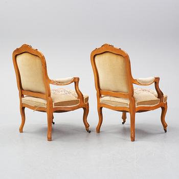 A set of sofa, two armchairs and six chairs, Louis XV-style, ca 1900.