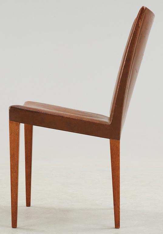 A Bruno Mathsson oak and brown leather chair, Karl Mathsson, Värnamo 1940's.