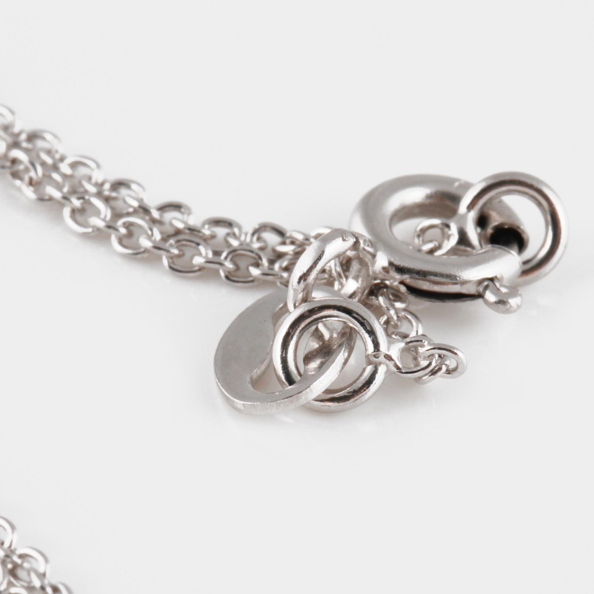 COLLIER, 18K vitguld med gammalslipad diamant ca 0.55 ct. Vikt 2,4 gram.