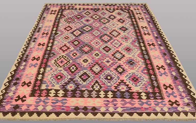 A carpet, Kilim, ca 290 x 204 cm.
